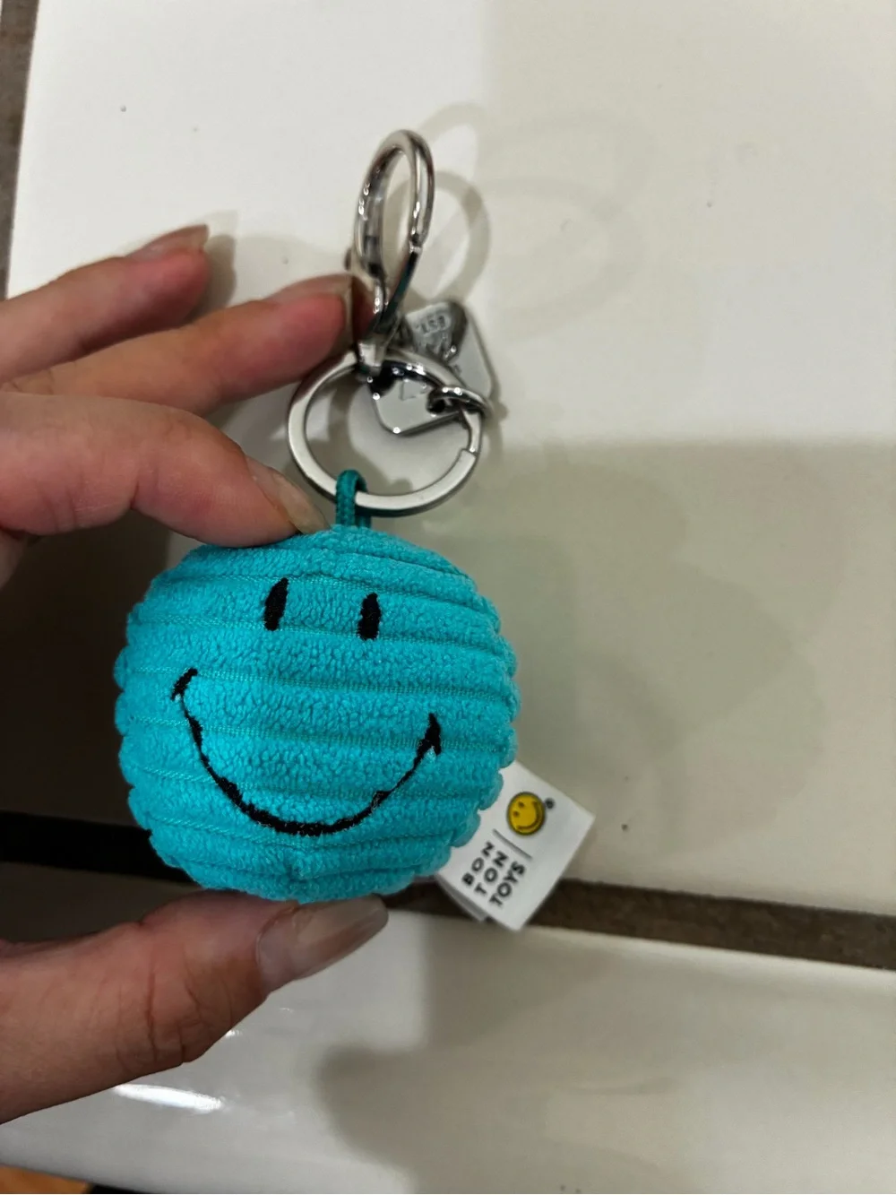 Teal Smiley Face Plush Keychain - Home Accents Decor